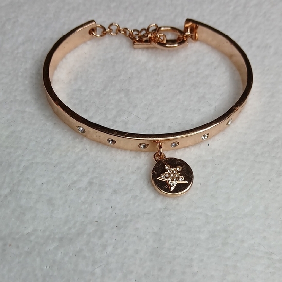 BCBGeneration Jewelry - BCBGeneration Rose Gold Bangle Bracelet with Crystal Star Charm